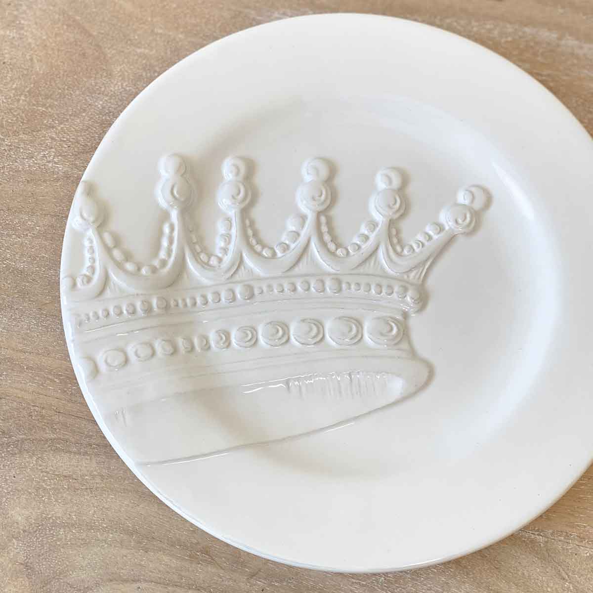 White deals embossed plates